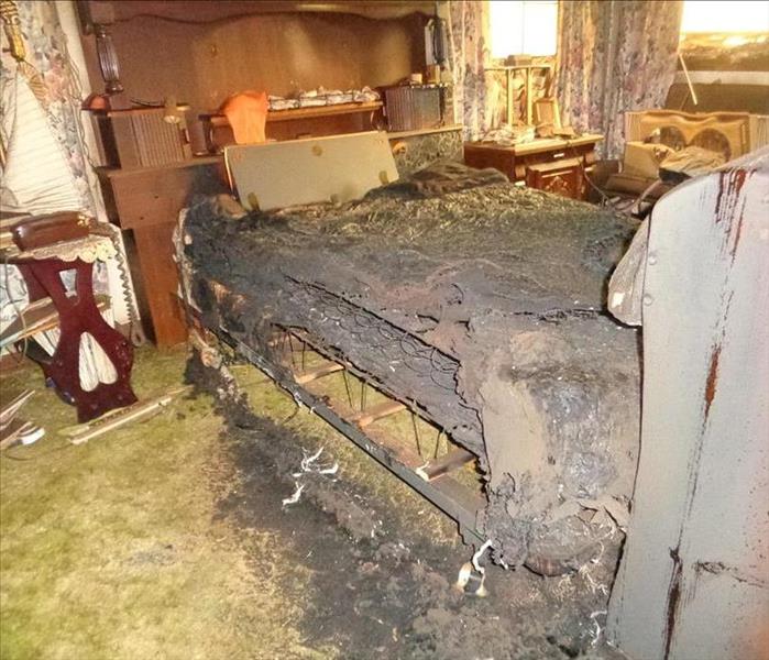 bed badly damaged after fire 